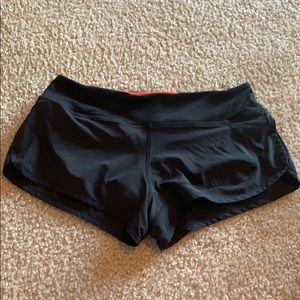Black running shorts, size small